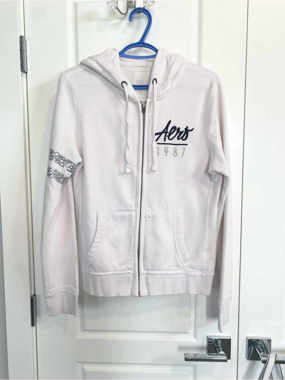 $10 Bundle Item Aeropostale White Zip-Front Hooded Sweatshirt with Sequin